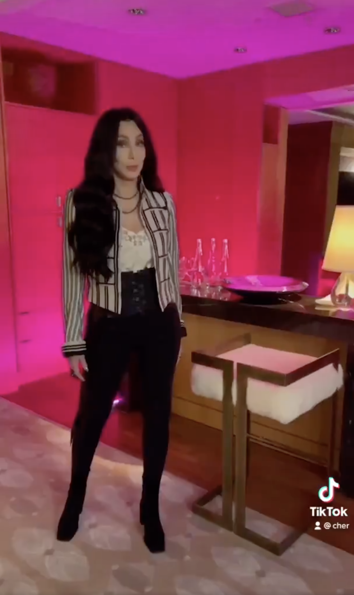 Cher appears as a brunette in her first TikTok video