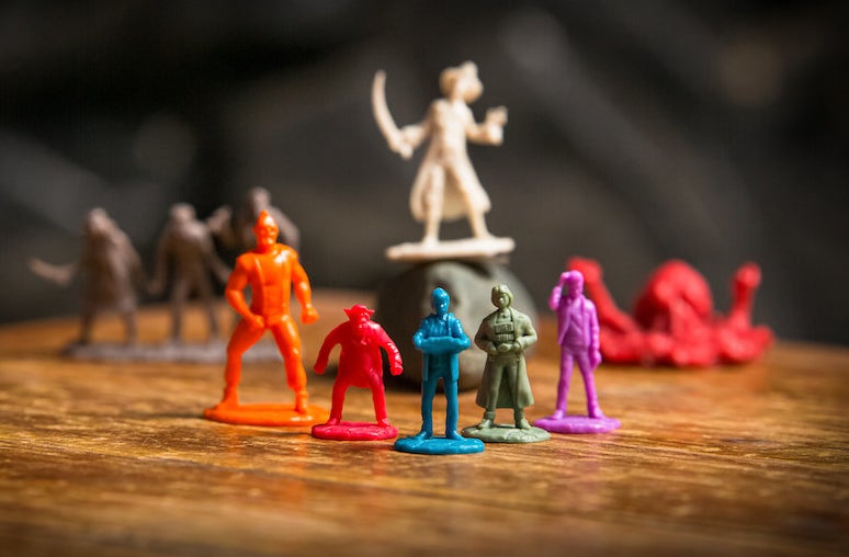 Close up of the character figurines, which are the player pieces