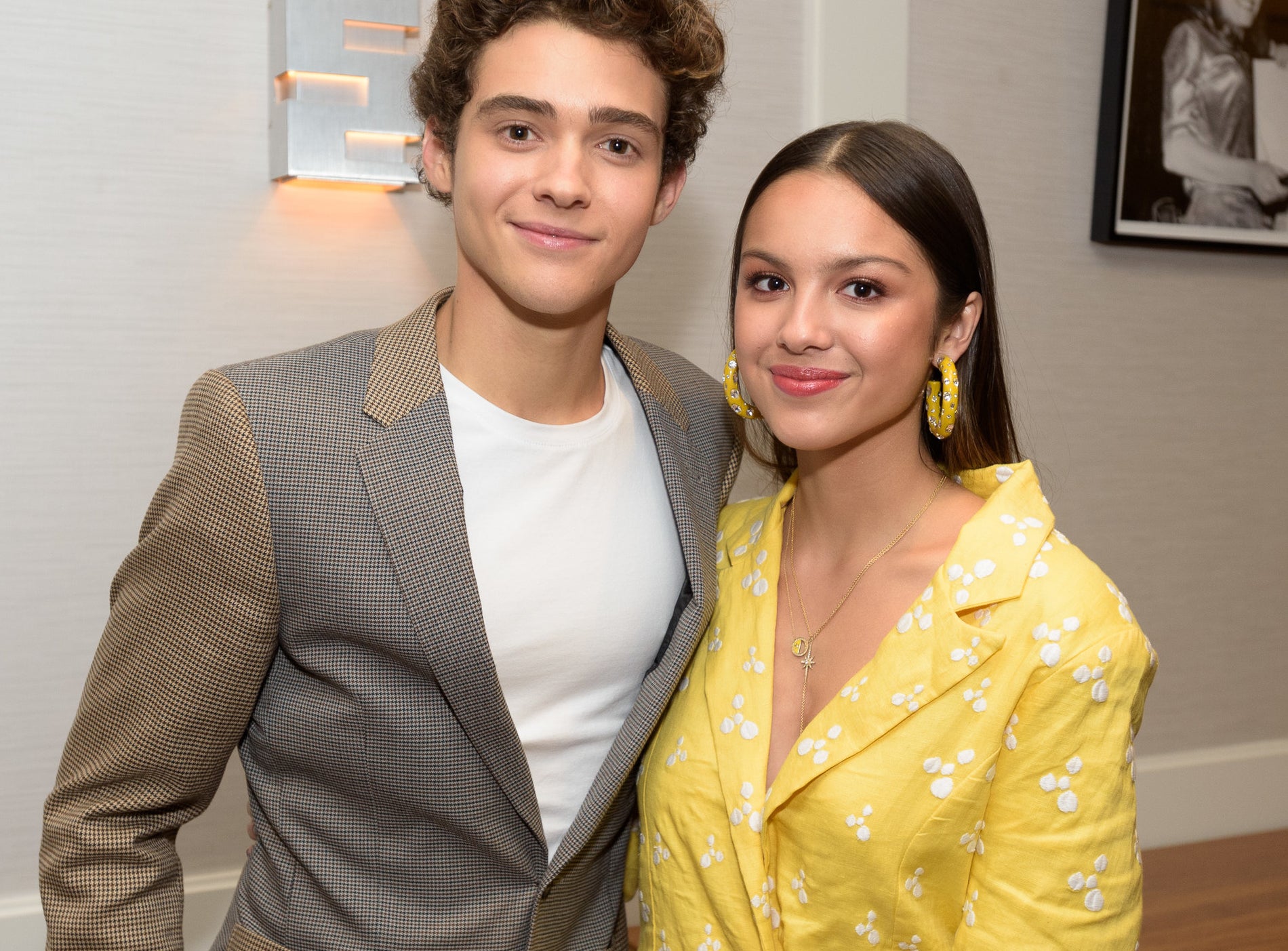 Joshua and Olivia pose together at an event