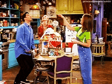 Ross, Rachel, and phoebe playing with bubbles and a doll house