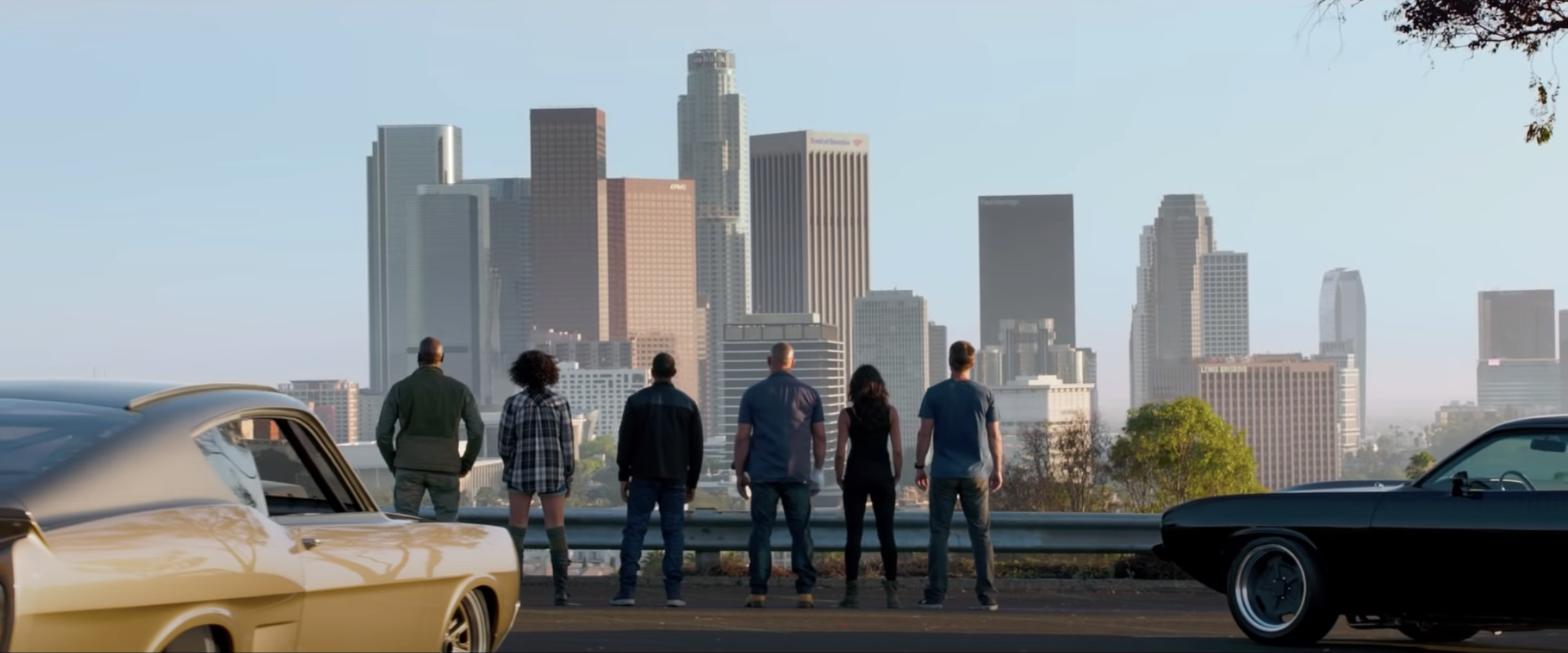 The crew looking at the city skyline