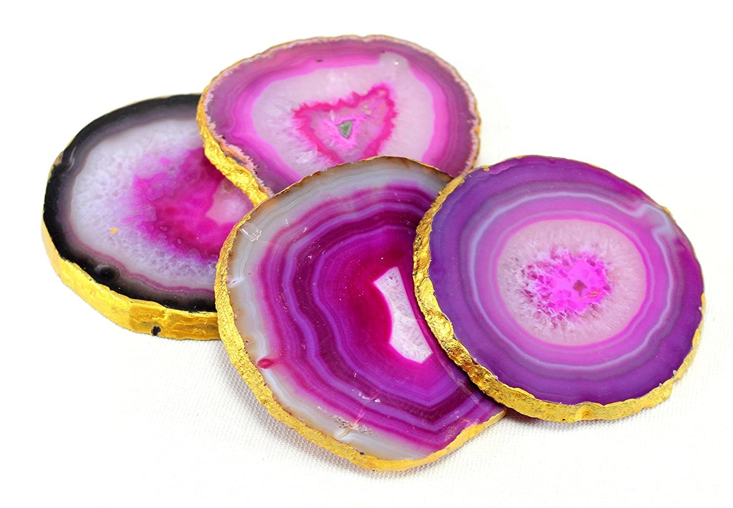Bright pink and purple agate coasters with a gold foil trim.