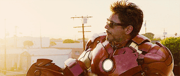 Tony eating a donut in the Iron Man suit