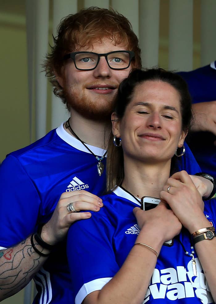 Musician Ed Sheeran and fiancé Cherry Seaborn look on during the Sky Bet Championship match between Ipswich Town and Aston Villa at Portman Road on April 21, 2018, in Ipswich, England