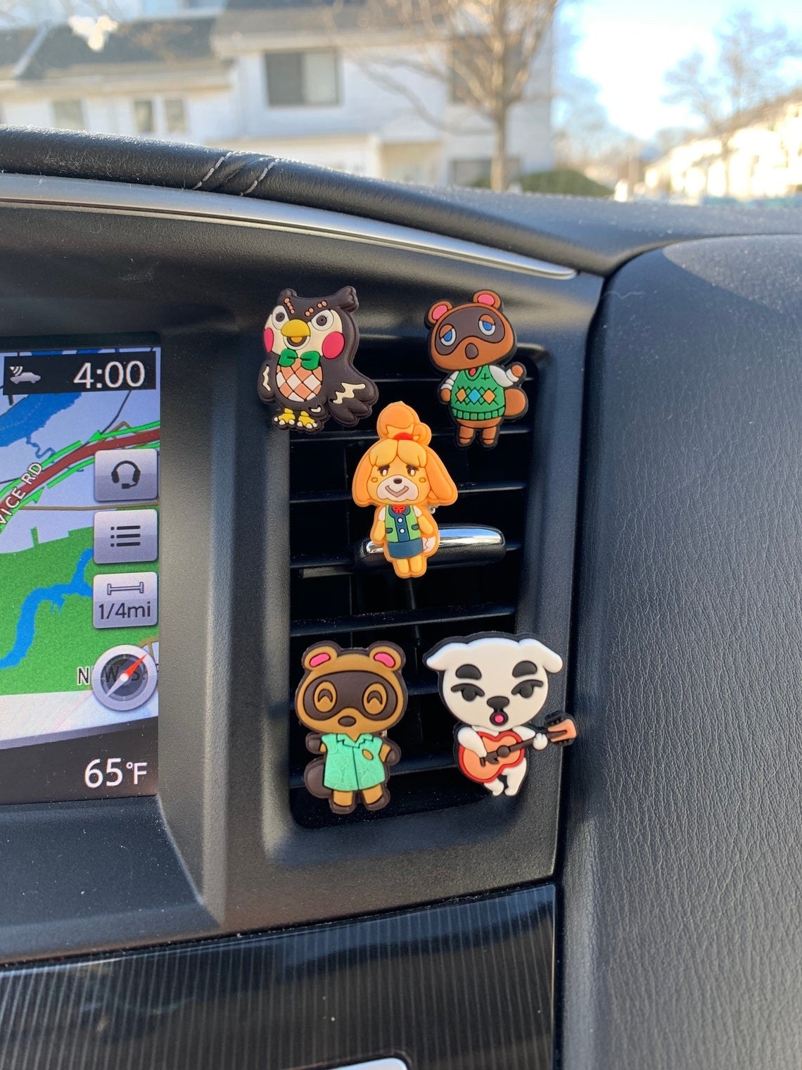 vent pins shaped like isabelle, kk slider, tom nook, timmy/tommy, and blathers