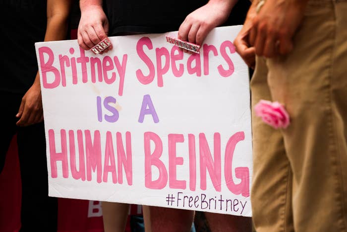 A poster that says "Britney Spears is a Human Being #Free Britney