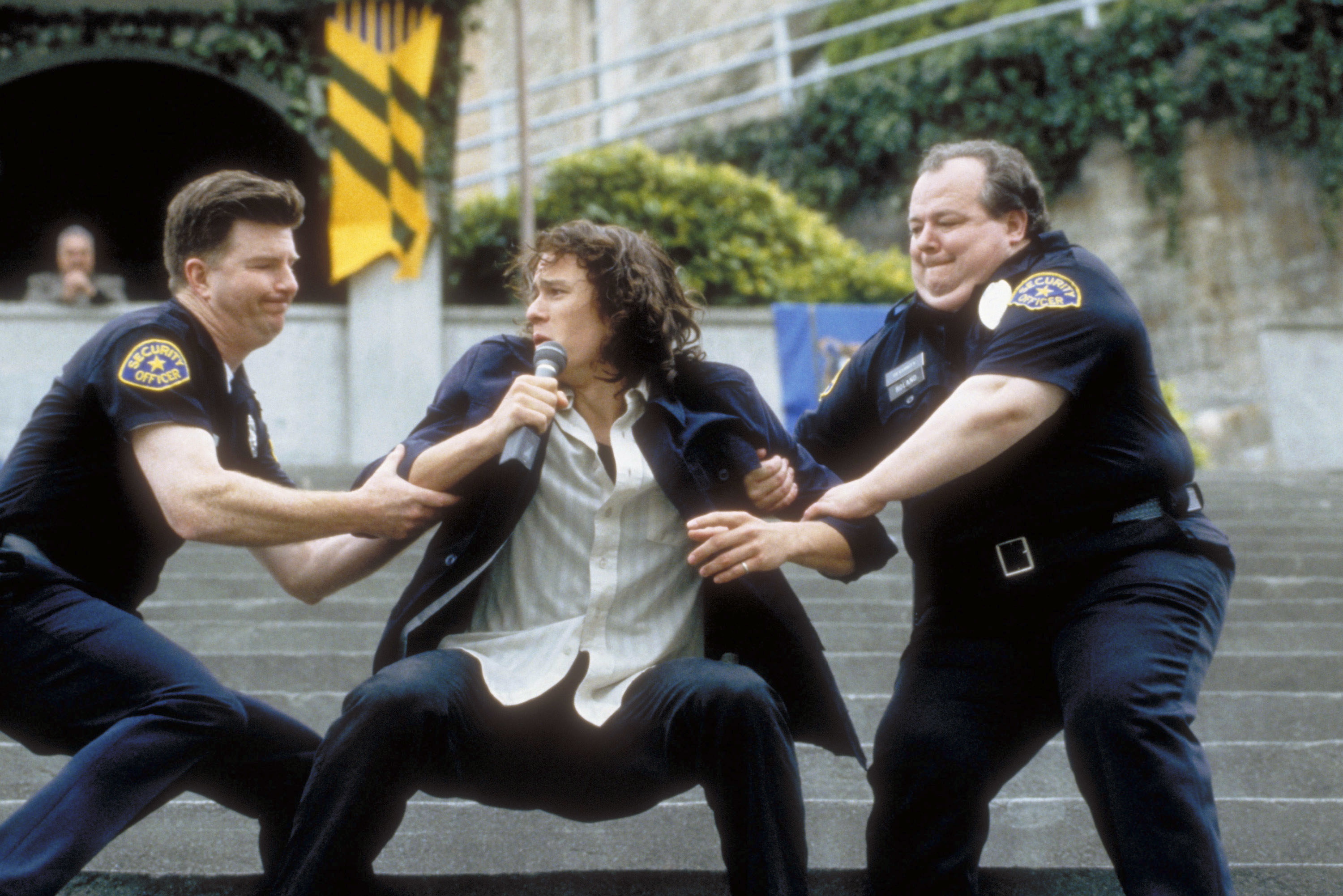 Heath Ledger as Patrick in &quot;10 Things I Hate About You&quot; being dragged away by the cops