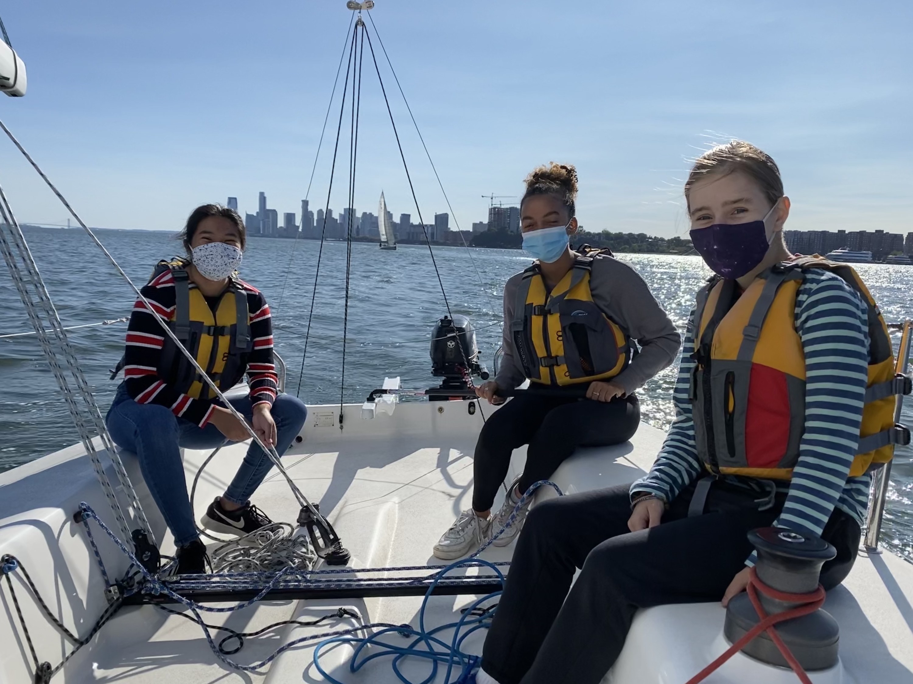 Three girls sailing