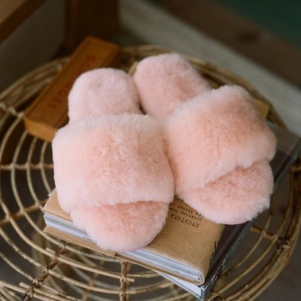 pink furry slippers with an open toe and open back