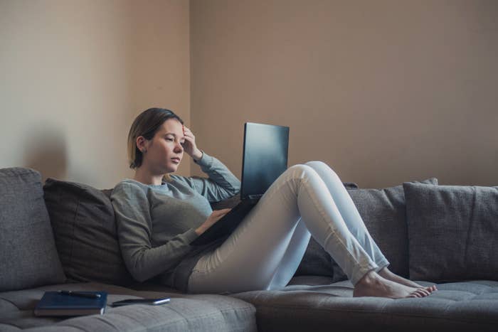 Young woman looking at jobs on her laptop