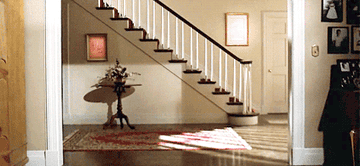 Tom Cruise&#x27;s character sliding into the foyer in his socks