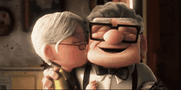 Carl from &quot;Up,&quot; the animated movie, receiving a kiss from his wife