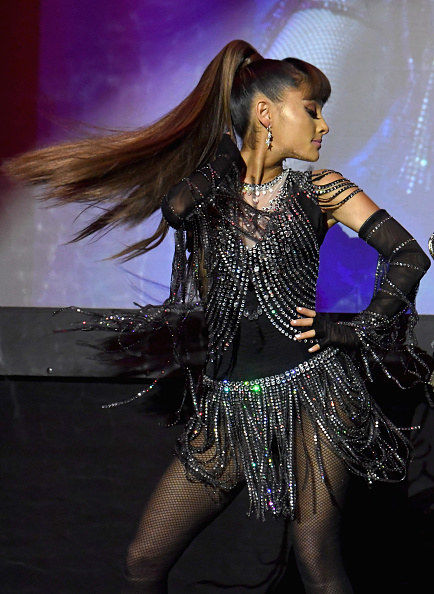 Ariana performed in a jeweled fringe dress with tights