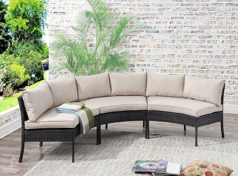 the patio sectional with cream colored cushions