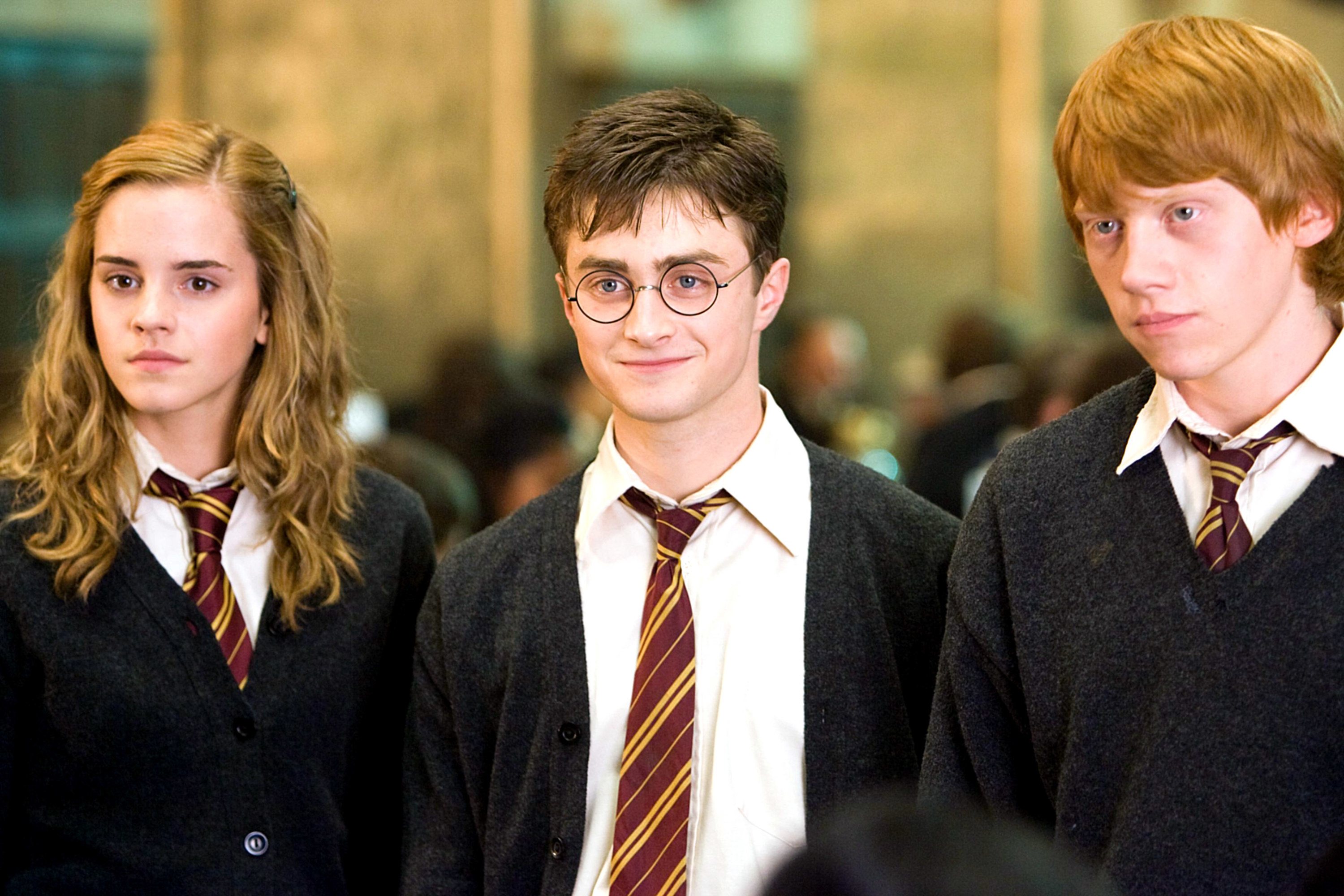 Hermione, Harry, and Ron in a scene from Harry Potter