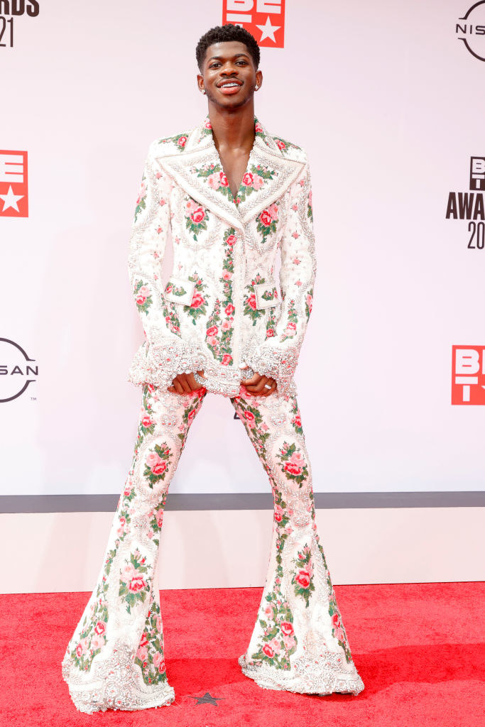 Lil Nas X attends the BET Awards 2021 in a floral print suit with wide legs