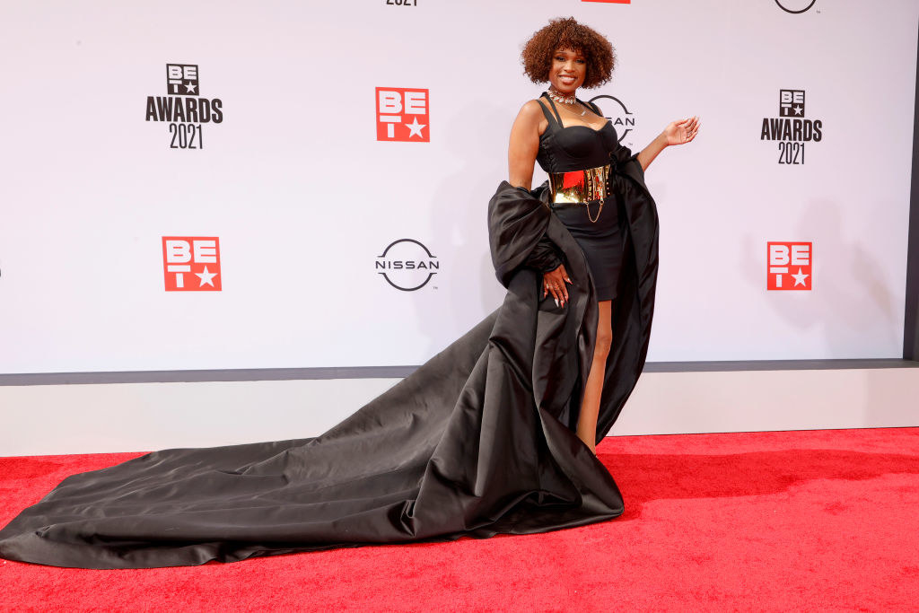 Jennifer Hudson attends the BET Awards 2021 in a dress with a large metal belt and matching duster