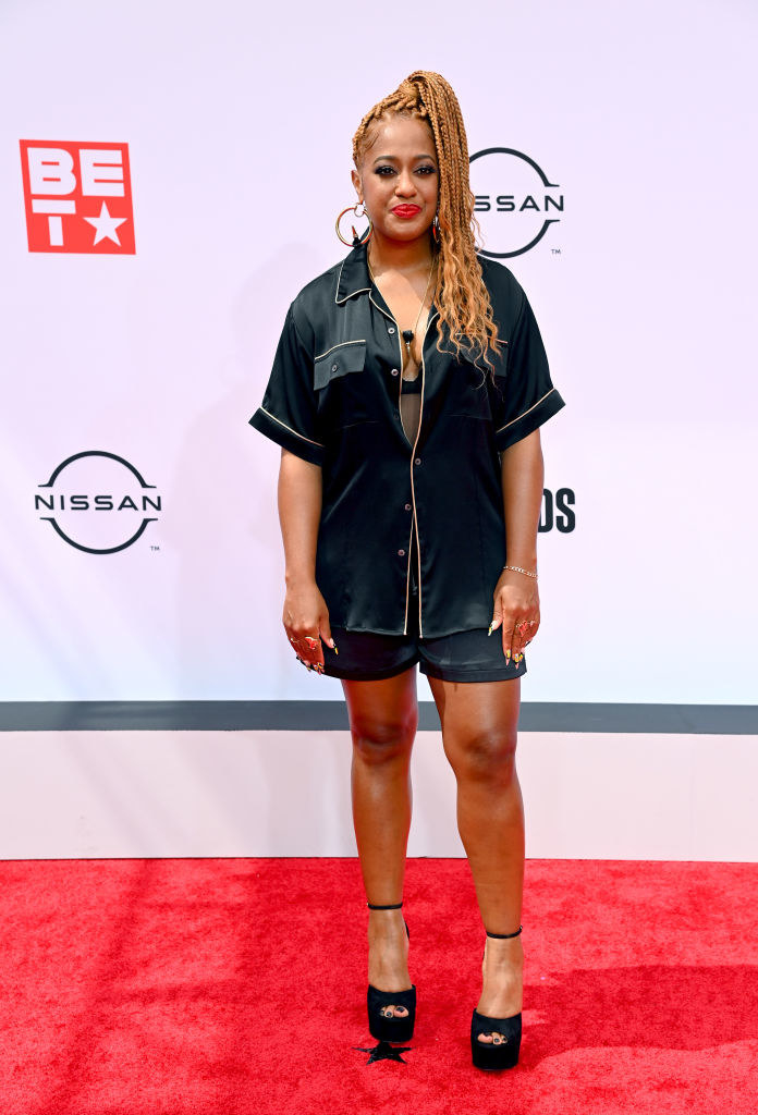 Rapsody attends the BET Awards 2021 in a satin pajama-inspired outfit and heels