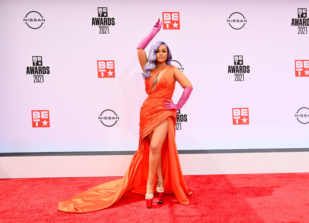 Latto attends the BET Awards 2021 in a one-shoulder gown and gloves