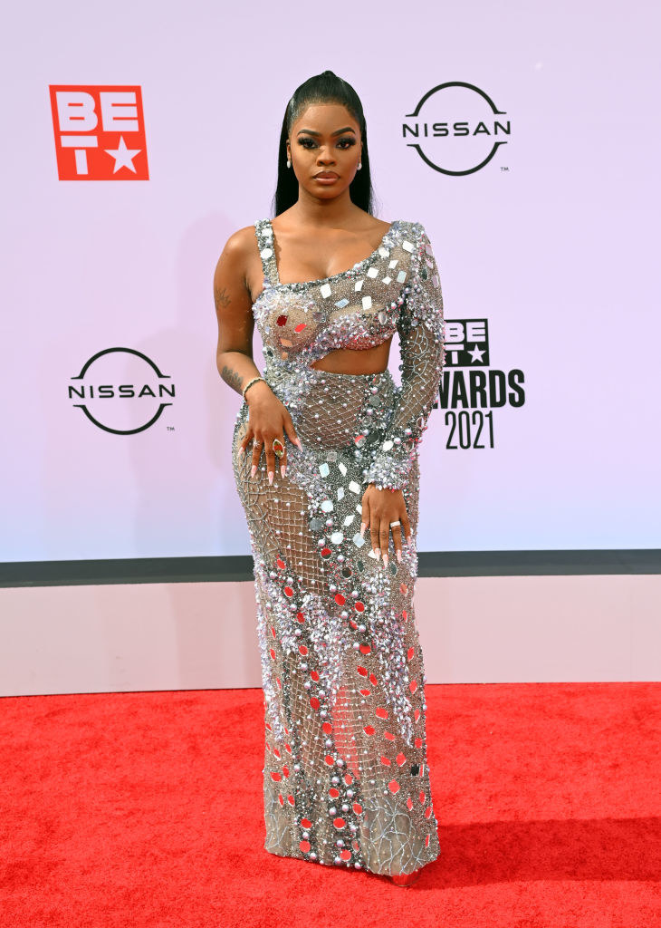 JT of City Girls attends the BET Awards 2021 in a sparkling dress
