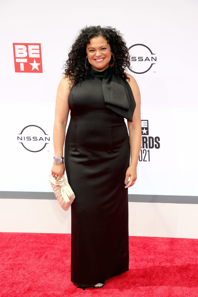Michelle Buteau attends the BET Awards 2021 in a long halter dress