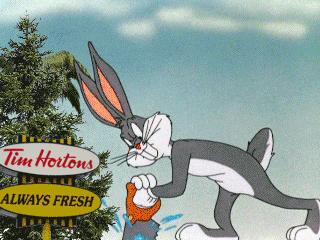 A GIF of Bugs Bunny using a saw to separate the US from Canada on a map.