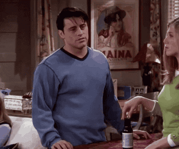 A GIF of Joey from friends shrugging.