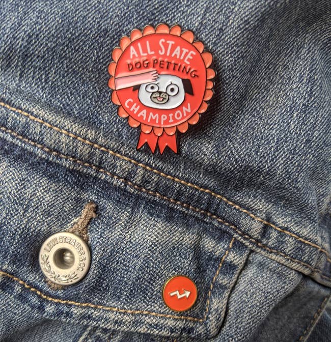the pin attached to a denim jacket