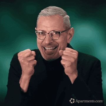 a gif of jeff goldblum excitedly waving his hands