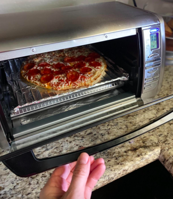 A customer review photo of them cooking a pizza in the oven