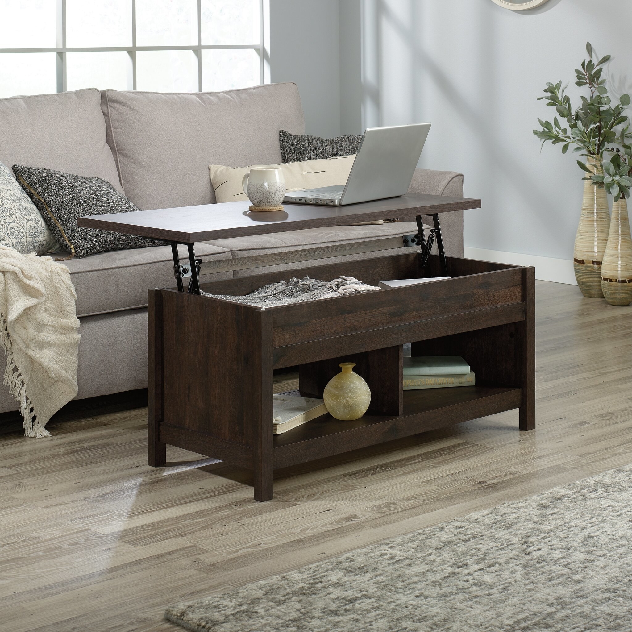 the coffee oak greyleigh tilden lift top coffee table in a living room