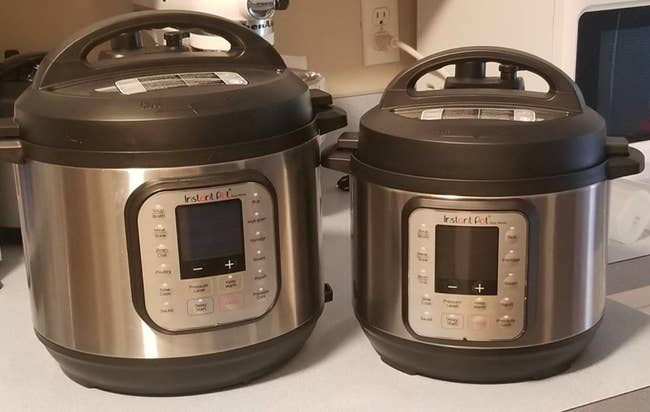A customer review photo of two Instant Pots in two sizes sitting on their counter