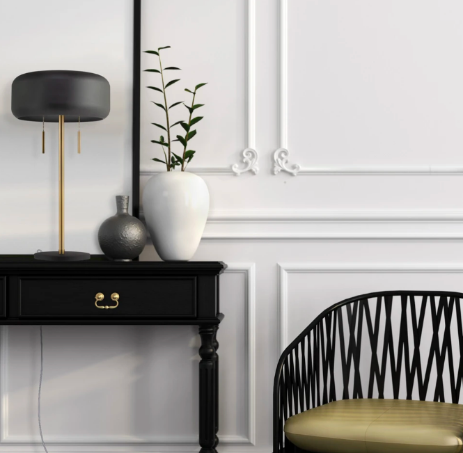 Black rounded table lamp with gold details