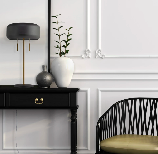 Black rounded table lamp with gold details
