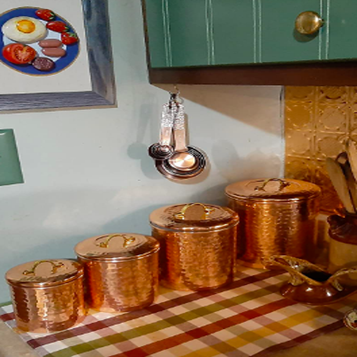 Reviewer's copper themed kitchen with the canisters 