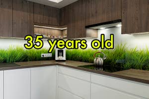 An image of a backsplash with grass growing behind it with "35 years old" over top