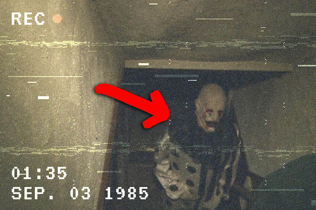 a terrifying clown walking up some basement stairs
