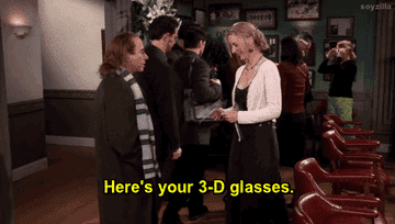 Phoebe handing out 3D glasses out at the funeral