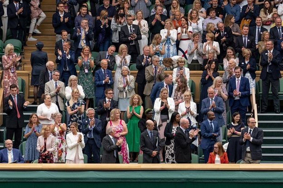 Wimbledon stands up to applause for COVID vaccine scientists