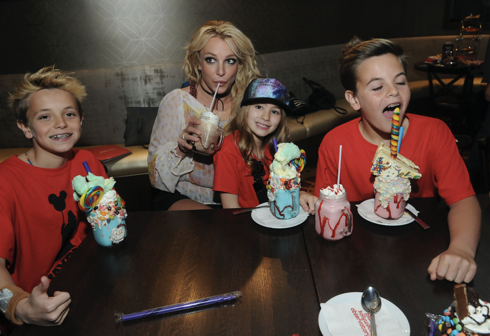 Britney Spears enjoys a family outing with Jayden Federline, Maddie Aldridge and Sean Federline at Planet Hollywood Disney Springs on March 13, 2017 in Orlando, Florida