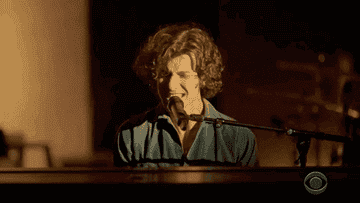 GIF of Shawn Mendes singing and playing piano for Global Citizen