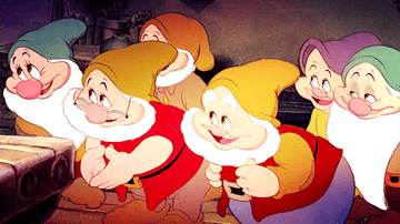 a gif of the seven dwarfs from snow white nodding yes
