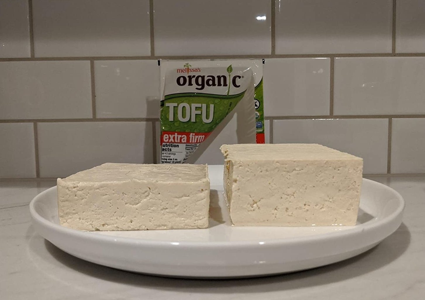 a reviewer photo of a block of pressed and unpressed and pressed tofu 