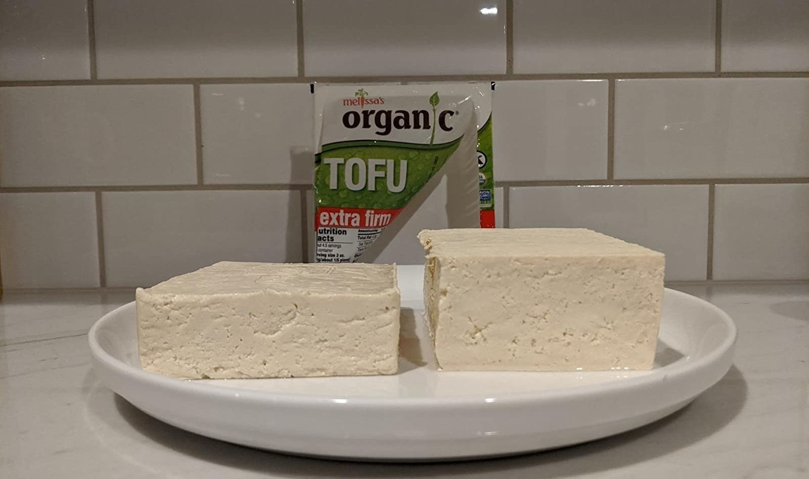 a reviewer photo of a block of pressed and unpressed and pressed tofu 