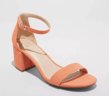 orange block heels with a thin ankle strap