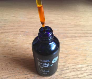 A customer review photo of the bottle of the Radha Beauty Rosehip Oil