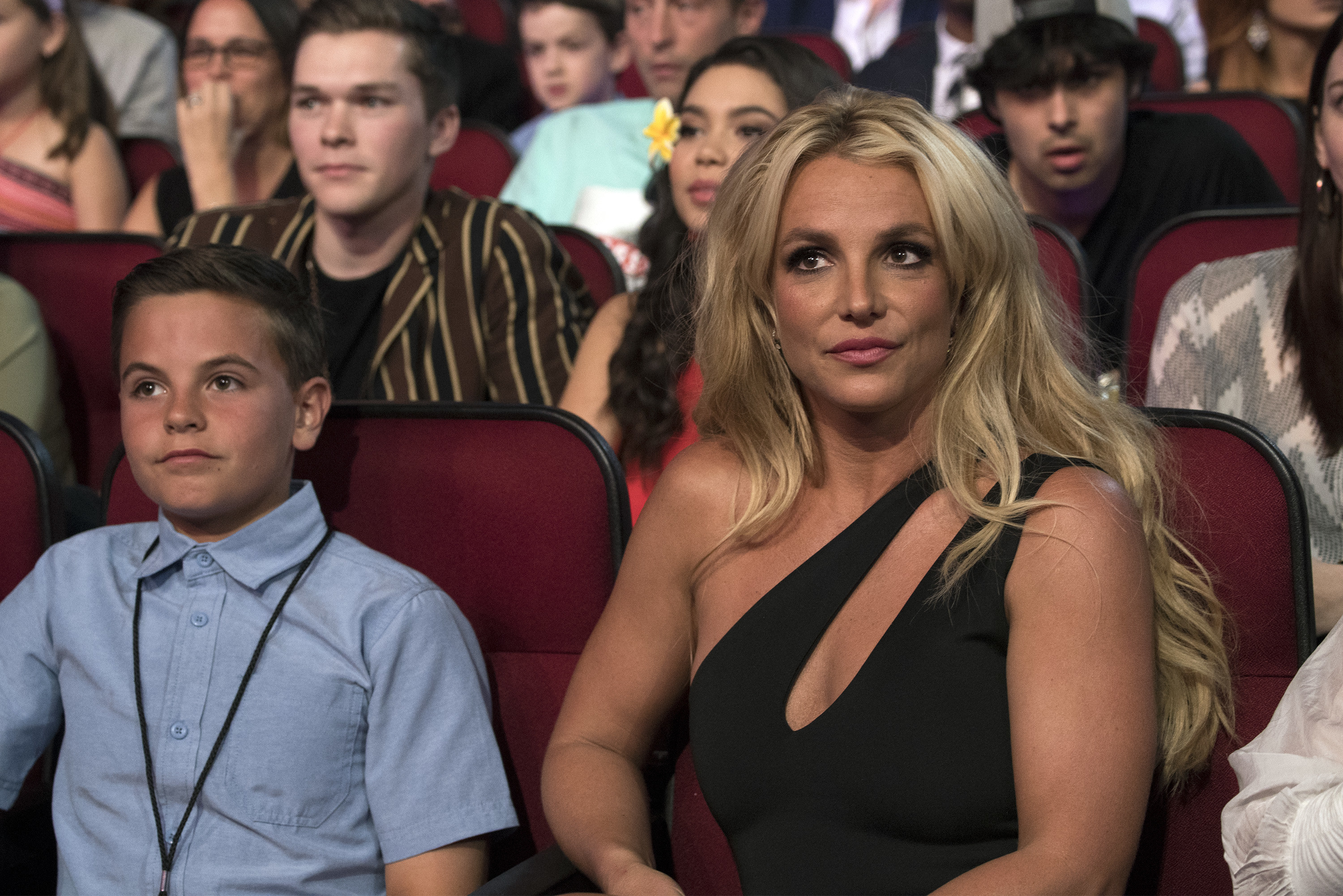 Britney sitting at an awards shows