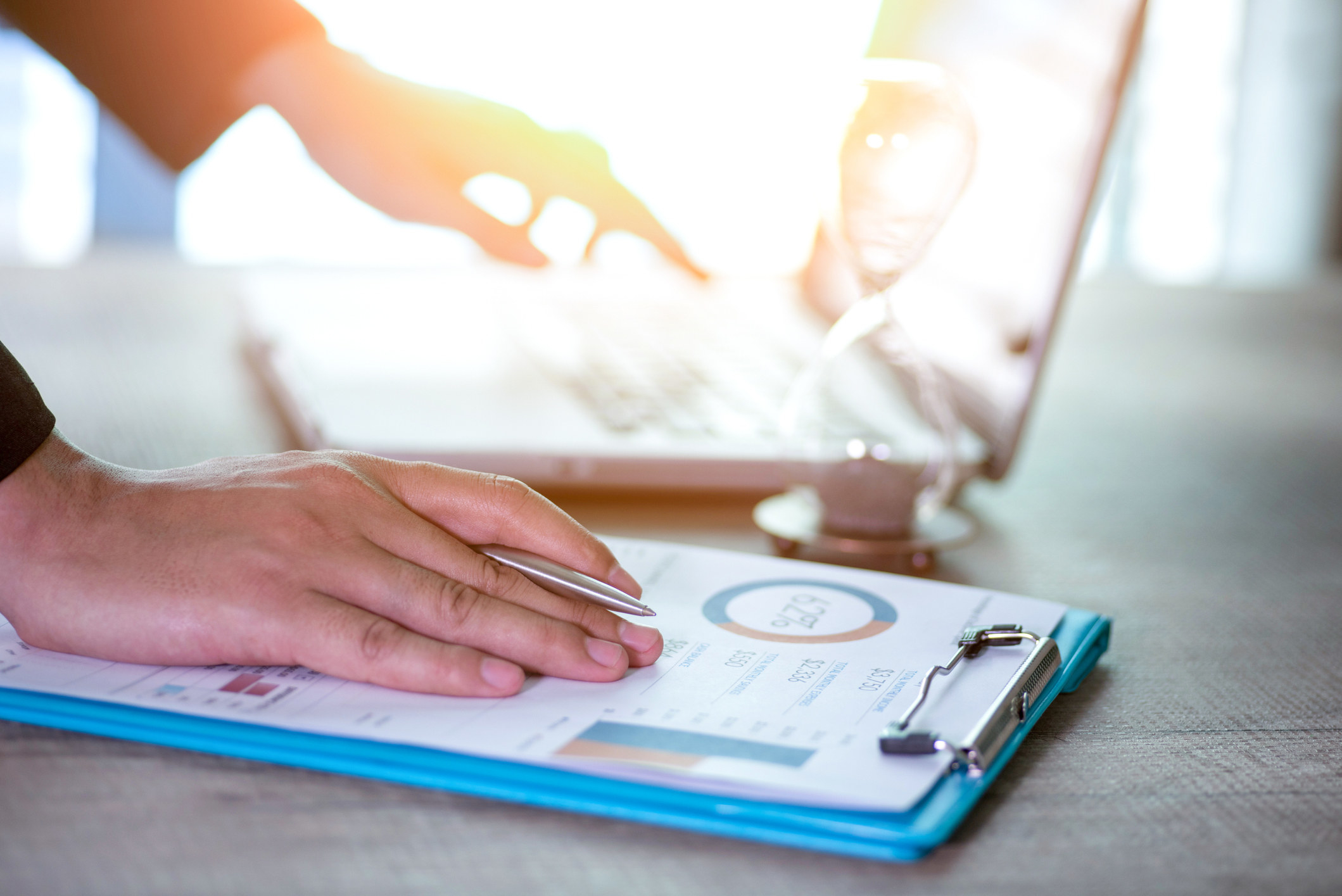 A consultant looking at documents