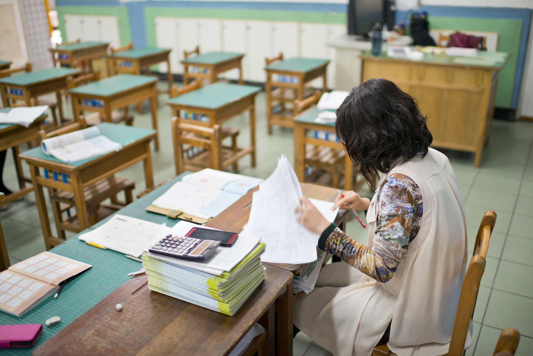 Woman grading papers