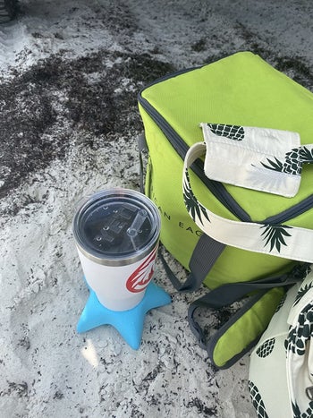 Reviewer's photo showing the cup holder holding a Yeti
